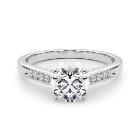 Platinum Round Cut Channel Set Solitaire Engagement Ring with Four-Prong Setting