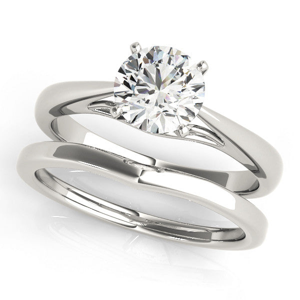 Platinum Round Solitaire Diamond Engagement Ring with Cathedral Setting and Four-Prong Mount on a Classic Band