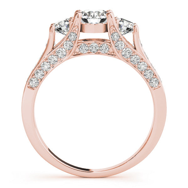 Rose gold Three-Stone Round Cut Diamond Ring with Channel-Set Band and Four-Prong Setting