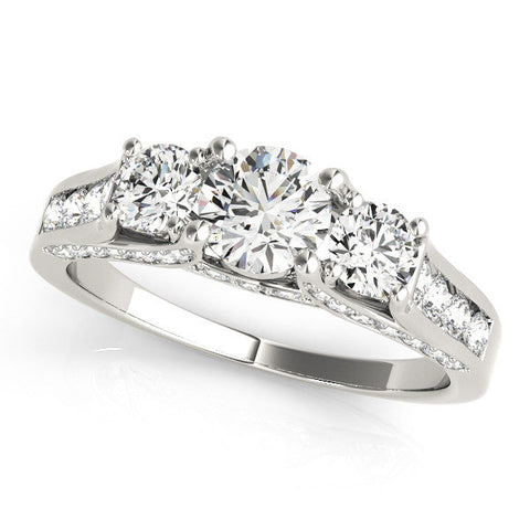 Silver Three-Stone Round Cut Diamond Ring with Channel-Set Band and Four-Prong Setting