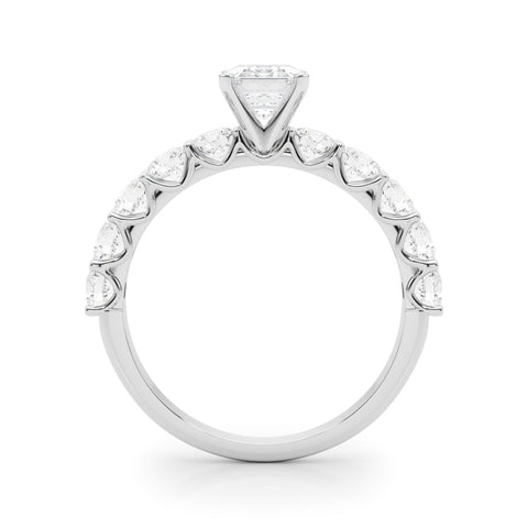 Platinum Emerald Diamond Prong Setting with Side Stones on a Pave Band