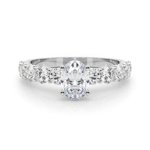 White gold Oval Diamond Prong Setting with Side Stones on a Pave Band