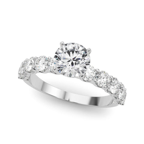 Platinum Round Diamond Prong Setting with Side Stones on a Pave Band