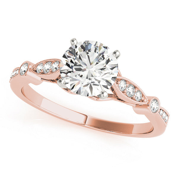 Rose gold Round Cut Diamond with Milgrain Marquise and Bezel Accents on a Solitaire Band with Prong Setting
