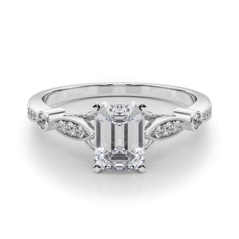 White gold Radiant Cut Diamond with Milgrain Marquise and Bezel Accents on a Solitaire Band with Prong Setting