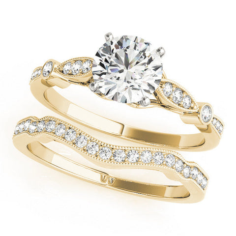 Yellow gold Round Cut Diamond with Milgrain Marquise and Bezel Accents on a Solitaire Band with Prong Setting