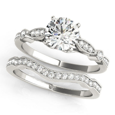 Platinum Round Cut Diamond with Milgrain Marquise and Bezel Accents on a Solitaire Band with Prong Setting