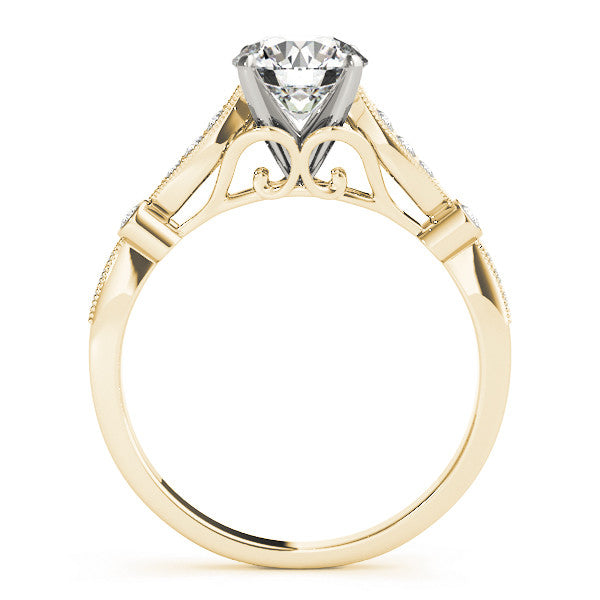 Yellow gold Round Cut Diamond with Milgrain Marquise and Bezel Accents on a Solitaire Band with Prong Setting