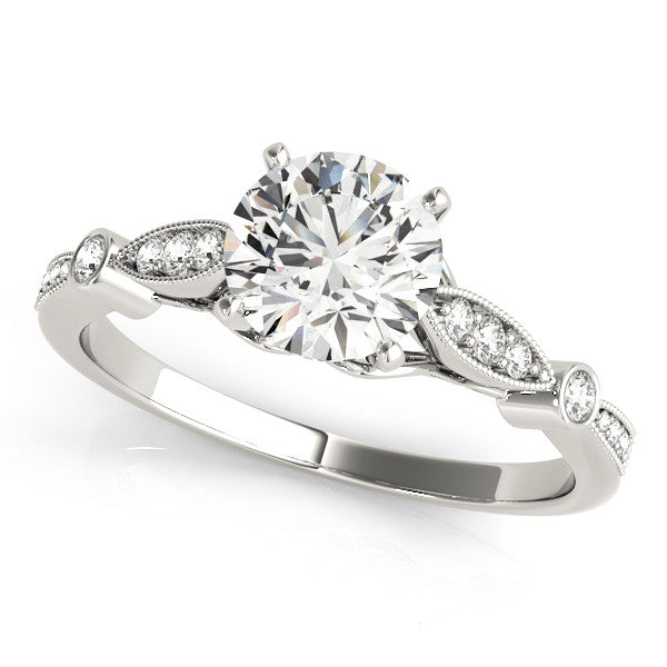 White gold Round Cut Diamond with Milgrain Marquise and Bezel Accents on a Solitaire Band with Prong Setting