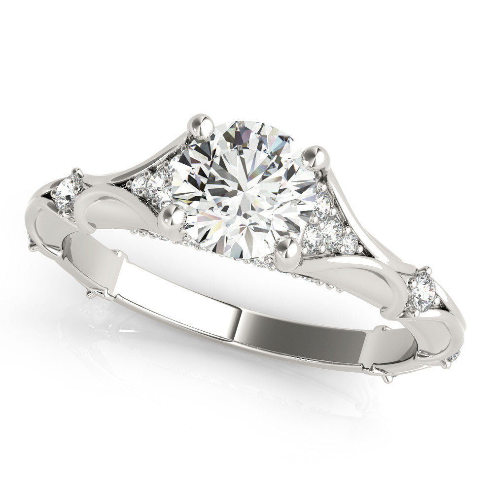 Platinum Round Cut Solitaire Engagement Ring with Pave Band and Four-Prong Setting