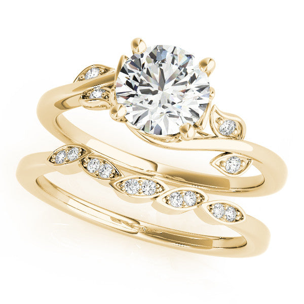 Yellow gold Round Solitaire Twist Engagement Ring with Leaf Accents and Prong Setting