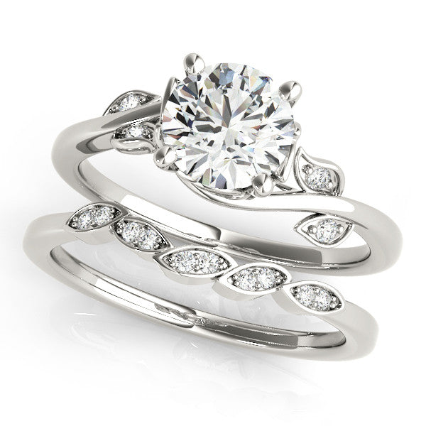 Silver Round Solitaire Twist Engagement Ring with Leaf Accents and Prong Setting