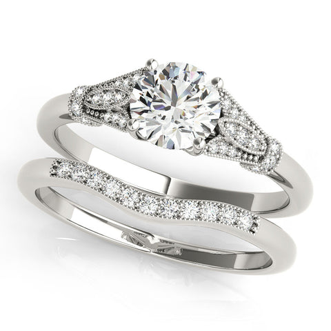 Platinum Round Brilliant Solitaire with Pave Band and Four-Prong Setting