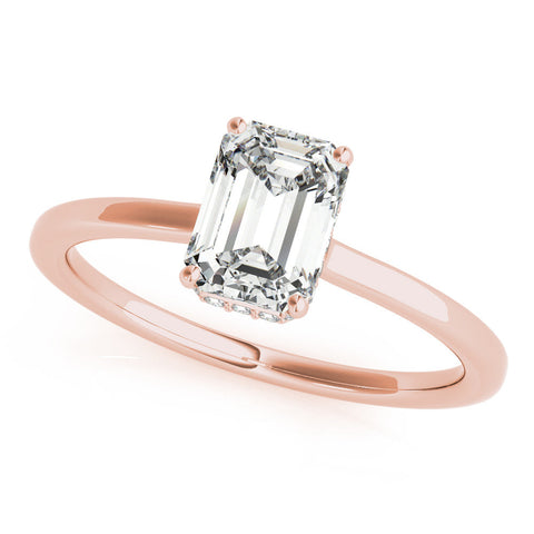 Rose gold Pear Cut Solitaire Engagement Ring with Four-Prong Setting on a Classic Band