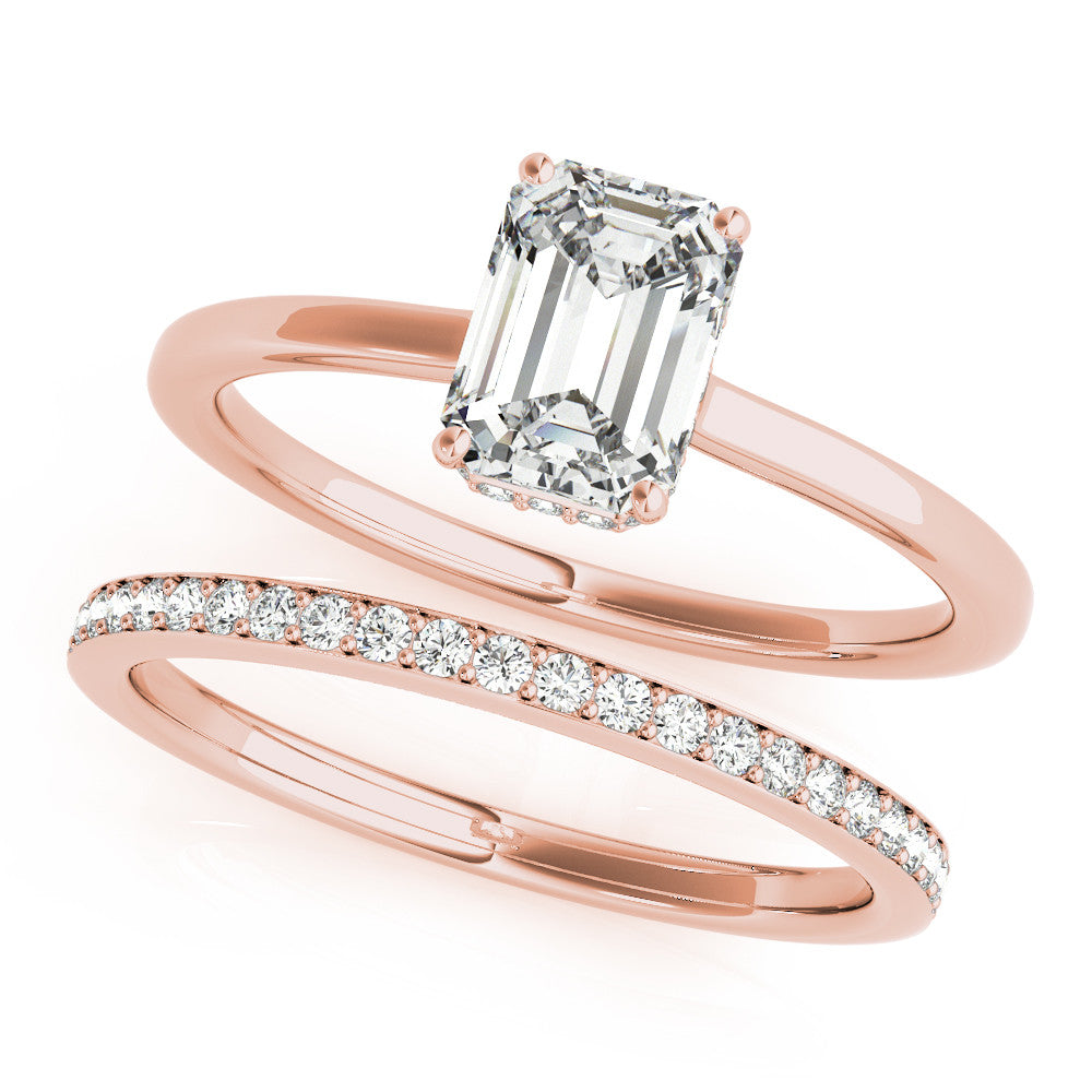 Rose gold Oval Cut Solitaire Engagement Ring with Four-Prong Setting on a Classic Band