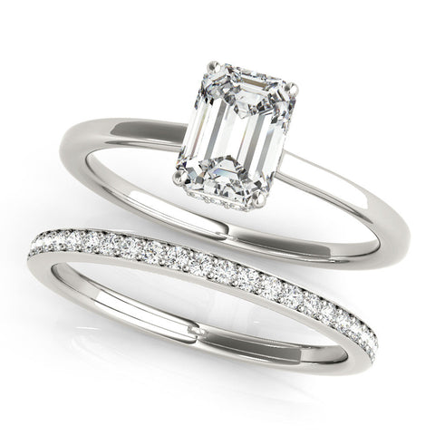 White gold Emerald Cut Solitaire Engagement Ring with Four-Prong Setting on a Classic Band