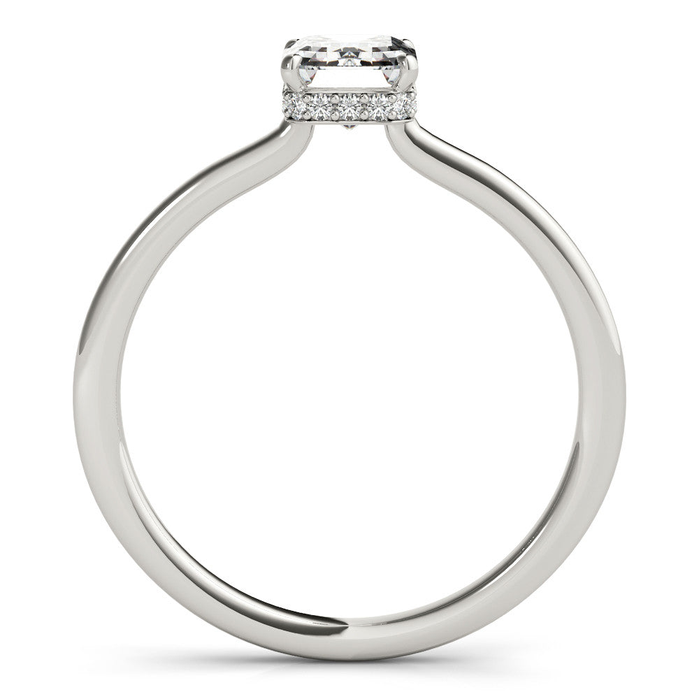 White gold Pear Cut Solitaire Engagement Ring with Four-Prong Setting on a Classic Band