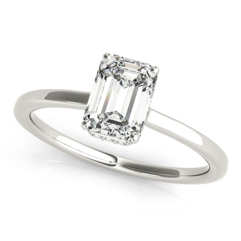 Platinum Oval Cut Solitaire Engagement Ring with Four-Prong Setting on a Classic Band