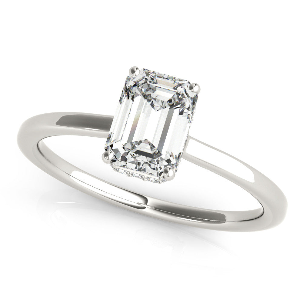 White gold Marquise Cut Solitaire Engagement Ring with Four-Prong Setting on a Classic Band