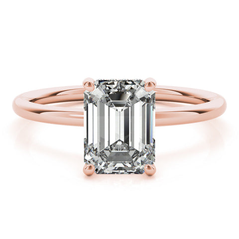 Rose gold Pear Cut Solitaire Engagement Ring with Four-Prong Setting and Classic Band
