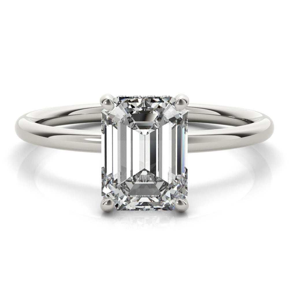White gold Round Cut Solitaire Engagement Ring with Four-Prong Setting and Classic Band
