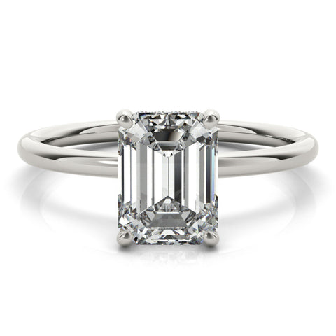 White gold Pear Cut Solitaire Engagement Ring with Four-Prong Setting and Classic Band