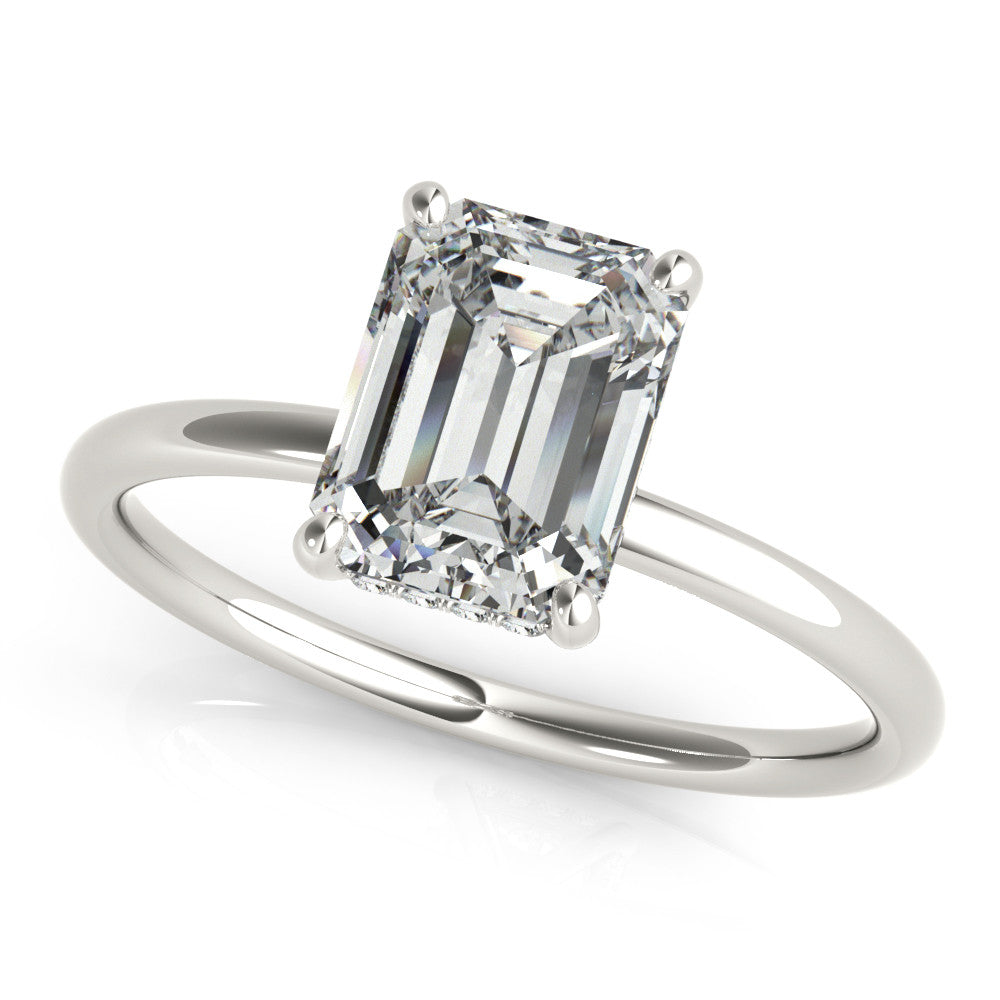 White gold Round Cut Solitaire Engagement Ring with Four-Prong Setting and Classic Band