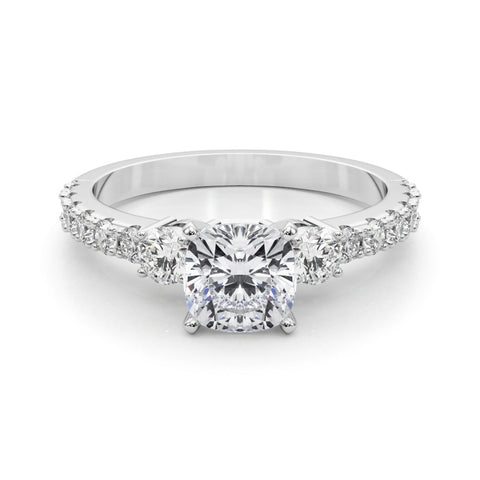 Platinum Cushion Cut Three-Stone Diamond Pavé Band with Prong Setting