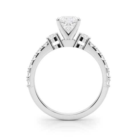 Platinum Cushion Cut Three-Stone Diamond Pavé Band with Prong Setting