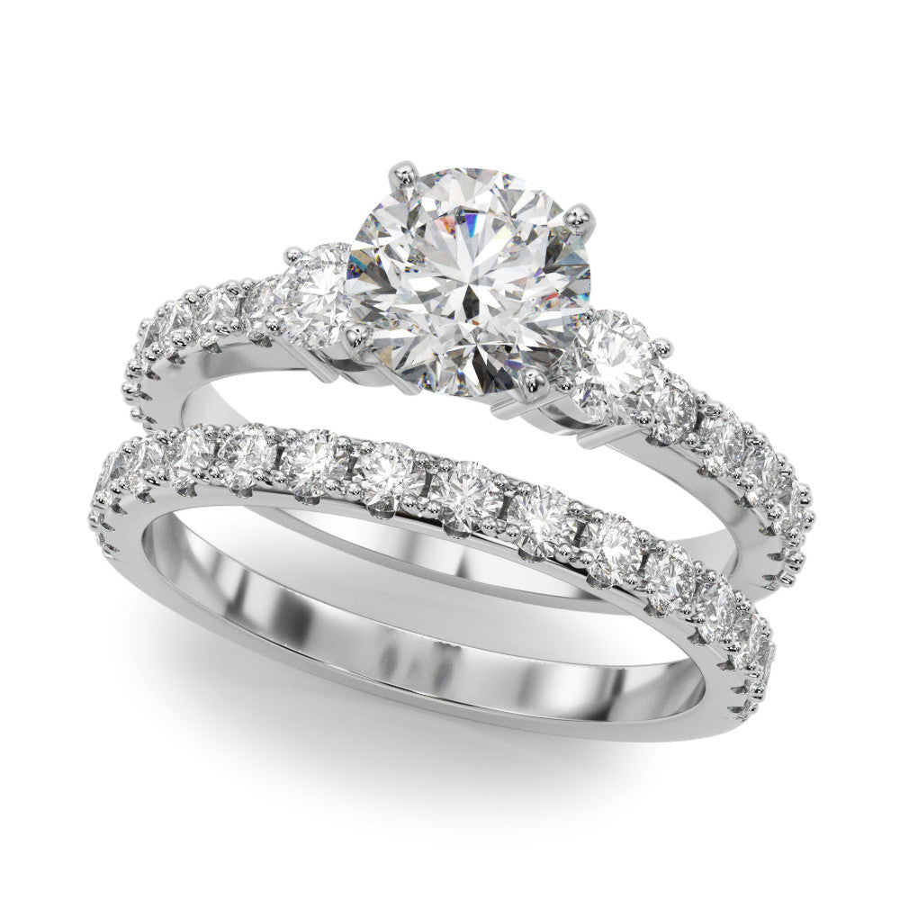 Platinum Round Cut Three-Stone Diamond Pavé Band with Prong Setting