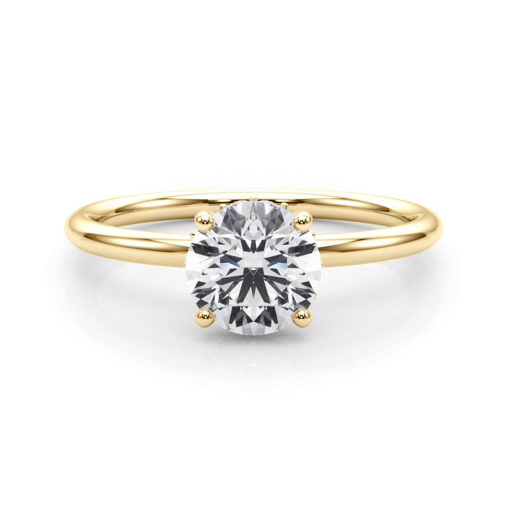 Yellow gold Round Solitaire Diamond Ring with a Classic Band and Four-Prong Setting