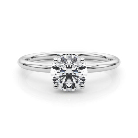Silver Round Solitaire Diamond Ring with a Classic Band and Four-Prong Setting