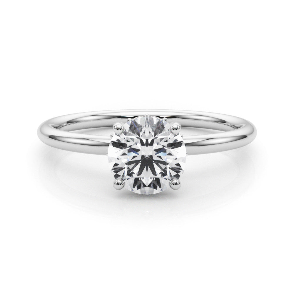 White gold Round Solitaire Diamond Ring with a Classic Band and Four-Prong Setting
