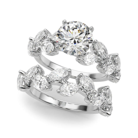 White gold Round Brilliant Diamond Solitaire with Marquise and Pear Accent Stones on a Split Shank Band with Four-Prong Setting