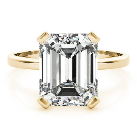 Yellow gold Emerald Cut Solitaire Ring with Four-Prong Setting and Classic Band
