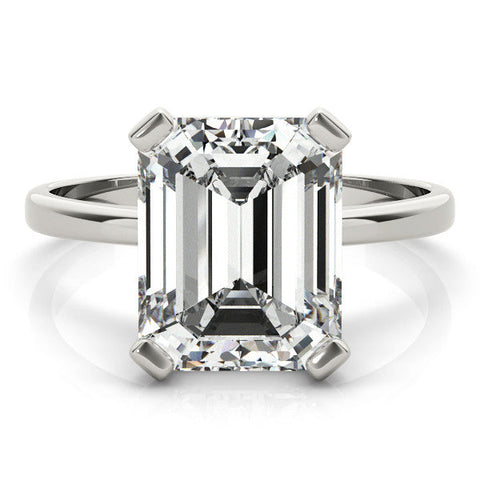 Silver Emerald Cut Solitaire Ring with Four-Prong Setting and Classic Band