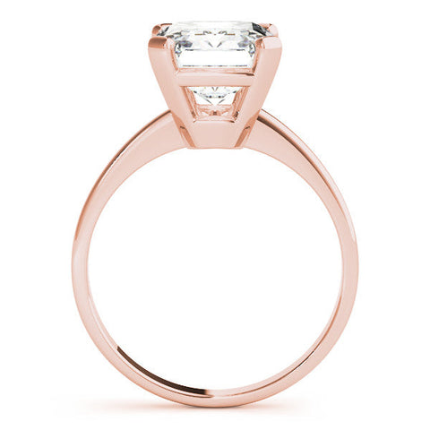 Rose gold Pear Cut Solitaire Ring with Four-Prong Setting and Classic Band