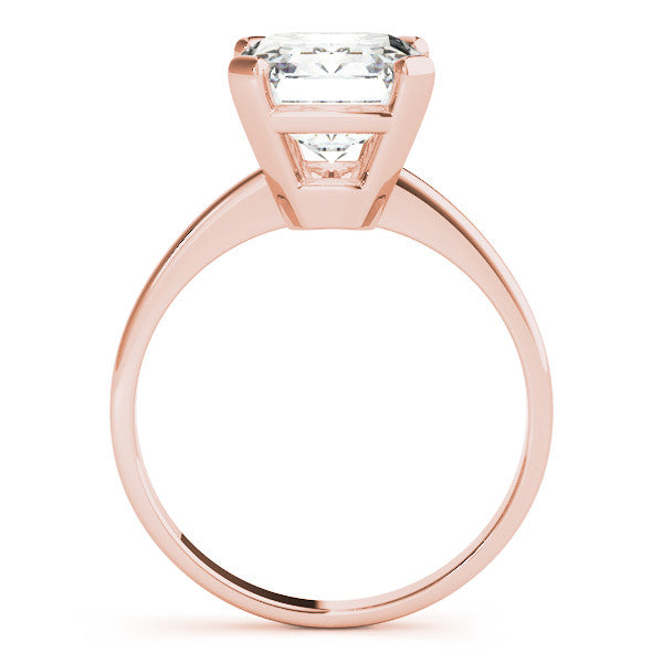 Rose gold Marquise Cut Solitaire Ring with Four-Prong Setting and Classic Band
