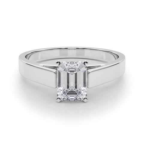 Silver Emerald Solitaire Engagement Ring with Four-Prong Setting and Tapered Band