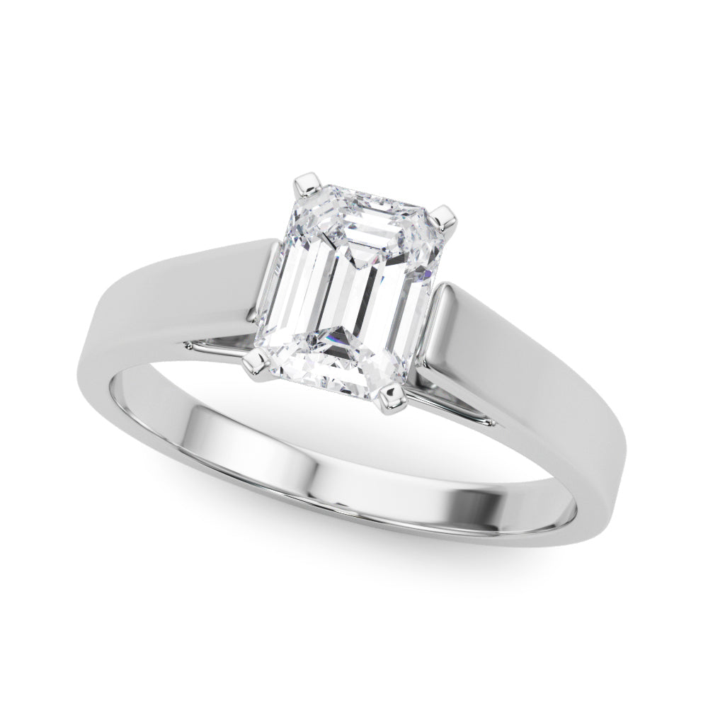 Platinum Emerald Solitaire Engagement Ring with Four-Prong Setting and Tapered Band