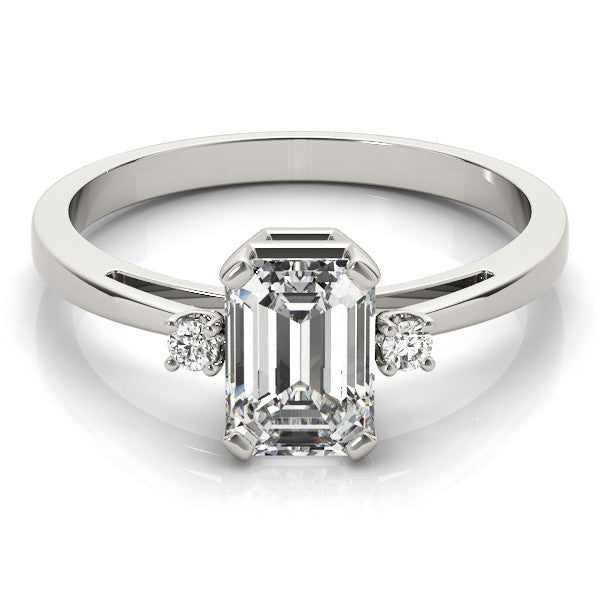 White gold Emerald Cut Three-Stone Solitaire Ring with Round Accent Diamonds and Four-Prong Setting