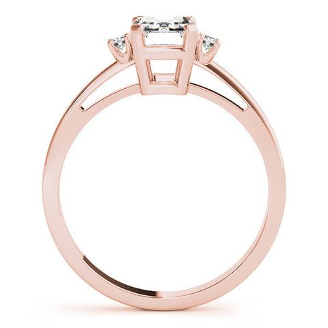 Rose gold Emerald Cut Three-Stone Solitaire Ring with Round Accent Diamonds and Four-Prong Setting