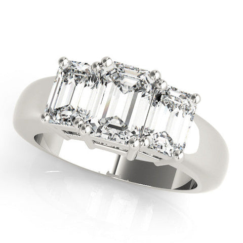 Platinum Four-Stone Marquise Cut Diamond Ring with Prong Setting on a White Gold Band