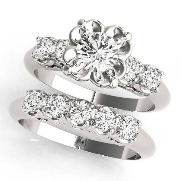 Platinum Oval Cut Diamond Floral Halo Engagement Ring with Shared Prong Setting