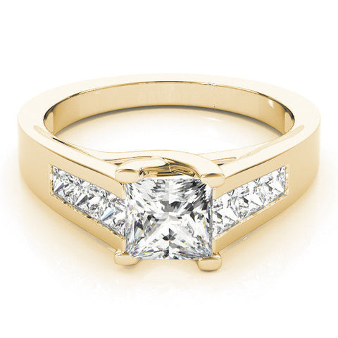 Yellow gold Pear Cut Channel Set Solitaire Ring with Four-Prong Setting