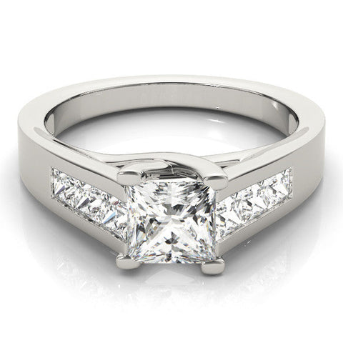 Platinum Round Cut Channel Set Solitaire Ring with Four-Prong Setting