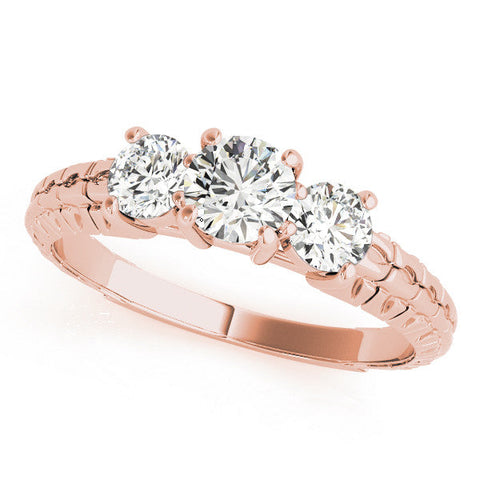 Rose gold Three-Stone Oval Cut Diamond Ring with Channel-Set Band and Prong Setting