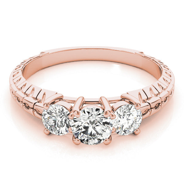 Rose gold Three-Stone Heart Cut Diamond Ring with Channel-Set Band and Prong Setting