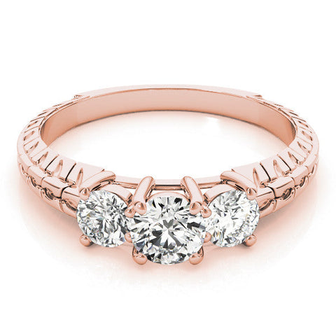 Rose gold Three-Stone Marquise Cut Diamond Ring with Channel-Set Band and Prong Setting