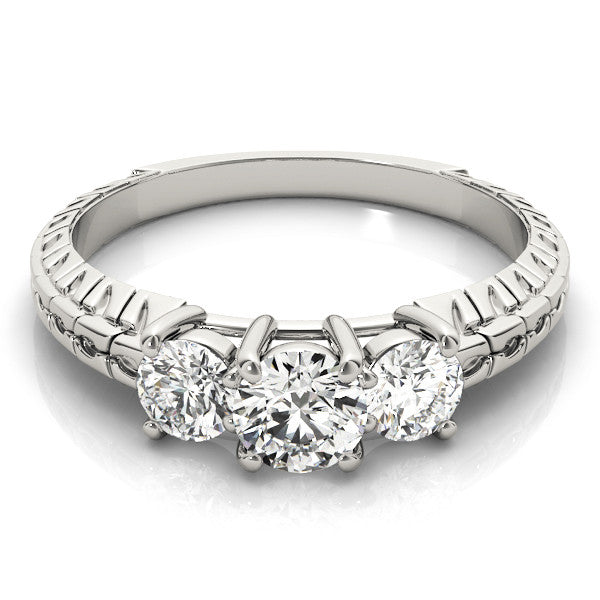 Platinum Three-Stone Pear Cut Diamond Ring with Channel-Set Band and Prong Setting